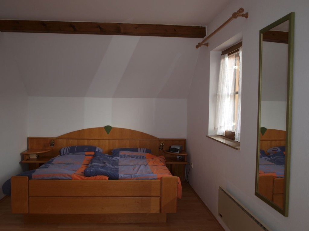 Schlafzimmer mit Balkon